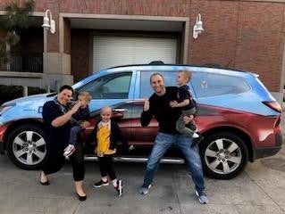 Family with a car